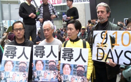 Thousands in Hong Kong protest the disappearance of five publishers